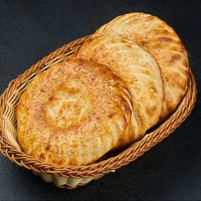 Лепешка Узбекская Кульчав Чайхонa бapaкaт по цене 150 ₽