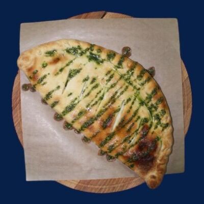 Пицца Кальцоне в Коралл ролл по цене 500 ₽