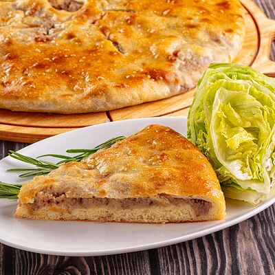 Пирог с говядиной и капустойв Осетинские Пироги по цене 1300 ₽