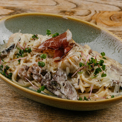 Паста с говядиной и грибами в Кубанские пивоварни по цене 650 ₽