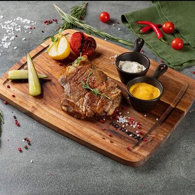 Стейк из свиной шеив Котлета по цене 950 ₽