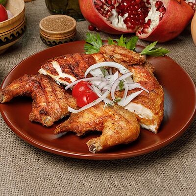 Цыпленок табака на гриле в Тандырофф по цене 590 ₽