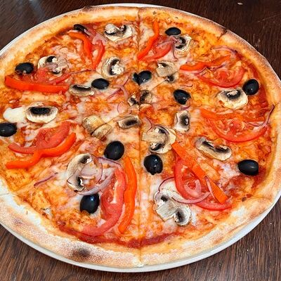 Пицца Вегетарианская в Помидорро по цене 525 ₽