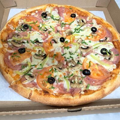 Пицца с ветчиной в Pizza Torino по цене 629 ₽