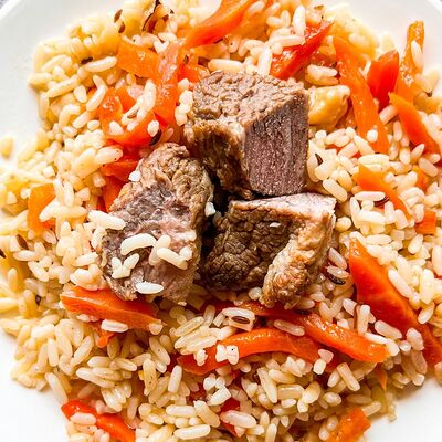 Плов с говядиной и нутом в Foodiegram по цене 550 ₽