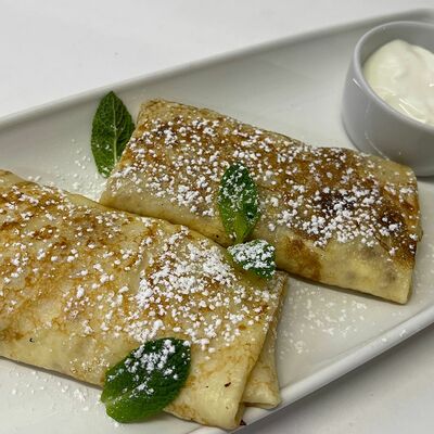 Блинчики с творогом и сметаной в Bon Bon по цене 377 ₽