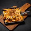 Poutine pork torn в Co.mein по цене 440