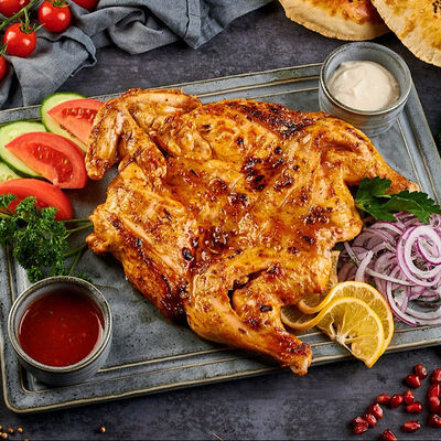 Цыпленок на мангале в Чайхана Фаррух по цене 1080 ₽