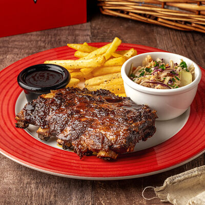 1/2 Рёбрышки Fridays Теннесси в TGI FRIDAYS по цене 995 ₽