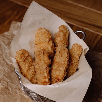 Стрипсы куриные в Калейдоскоп вкуса по цене 370 ₽