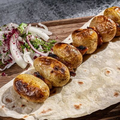 Молодой картофель с курдюком на углях в Дюшес по цене 200