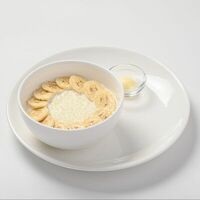 Каша рисовая на молоке со сливочным маслом и бананом в Yagoda