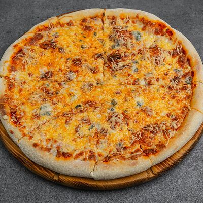 Пицца Четыре сыра в Гурман по цене 650 ₽