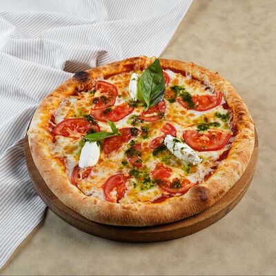 Пицца Маргарита 30 см в Компот по цене 640 ₽