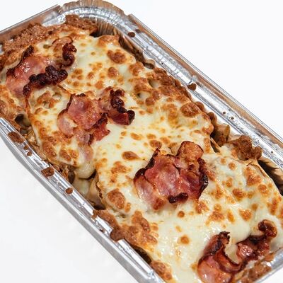 Паста с курицей и беконом под сыромв Пицца мигом по цене 629 ₽