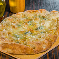 Пицца Четыре сыра в Pausa Caffe