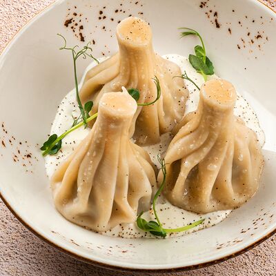 Хинкали с курицей и грибами в Омар Хайям Европа и Азия по цене 400 ₽