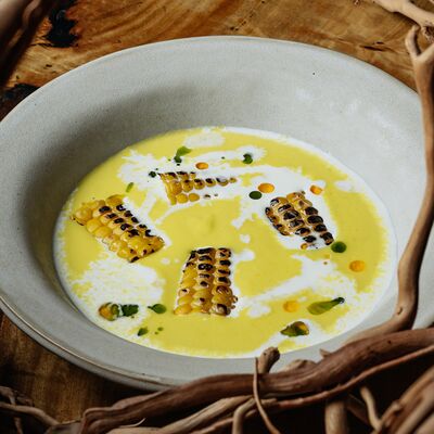 Кукурузный суп, жженые сливки, початок с огня в Айна по цене 950 ₽