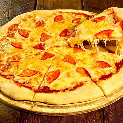 Пицца Маргарита в Мама-Папа по цене 870 ₽