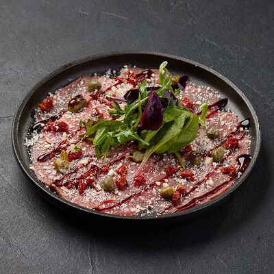 Карпаччо из говядины в По Чесноку по цене 555 ₽