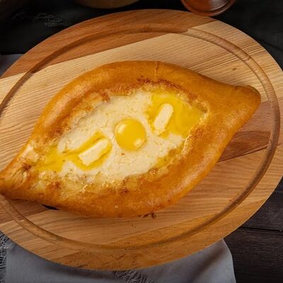 Хачапури по Аджарски в Мангал Хаус по цене 460 ₽