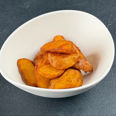 Картофель по-деревенски в По Чесноку по цене 253 ₽