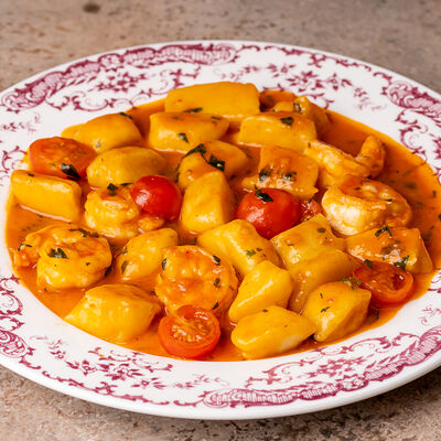 Ньокки арабьята с креветками и томатами в Lili по цене 900 ₽