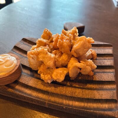 Попкорн из курицы в пивном кляре в Дикий койот по цене 450 ₽