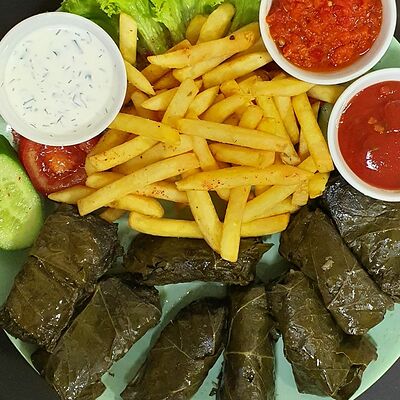 Долма из винoградных листьев по-узбекски в Zam-Zam по цене 350 ₽