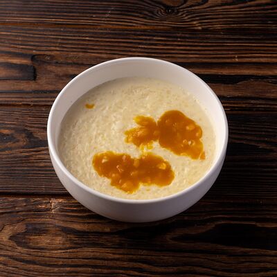 Каша рисовая на кокосовом молоке с изюмом в Luciano по цене 520 ₽