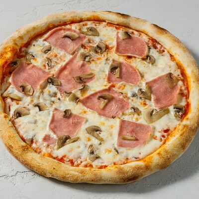 Пицца с ветчиной и грибами в Kosta пицца по цене 540 ₽