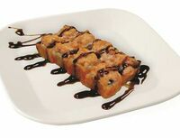 Ролл запеченный Калифорния с лососем в SushiPizza