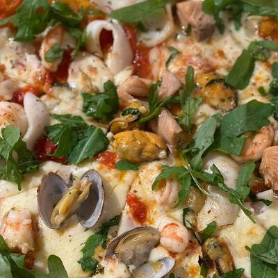 Пицца с морепродуктами в Trattoria Siesta по цене 1250 ₽
