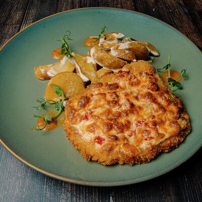 Шницель куриный с картофельными дольками в Вкус кафе по цене 528 ₽