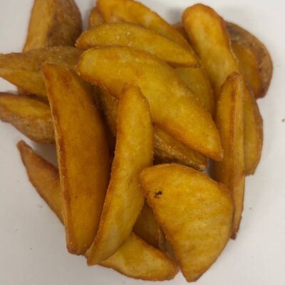 Картофельные дольки в Сеньор Помидор по цене 250 ₽