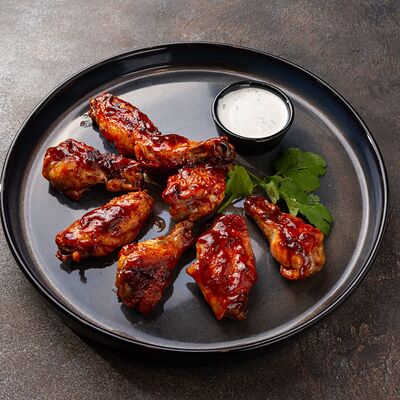 Куриные крылья в соусе барбекю и аджика в Sesilia по цене 780