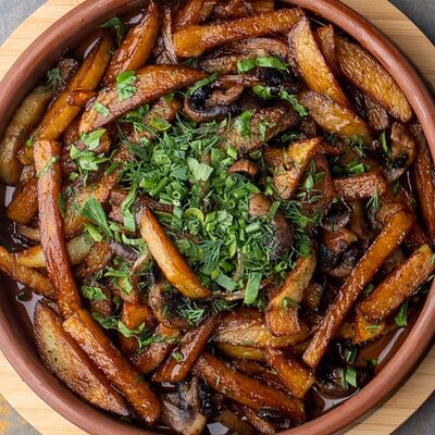 Картофель, жаренный с грибами в Айва по цене 290 ₽