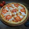 Пицца Поллов Luigis Pizza по цене 600