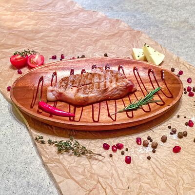 Premium стейк из cвинoй шейки в Гриль-бар по цене 580 ₽