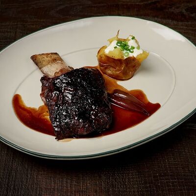 Копченое ребро, картофель в Dacha restaurant по цене 2400 ₽