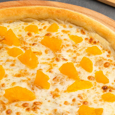 Средняя пицца Дюшес-мандарин в Престо по цене 830 ₽