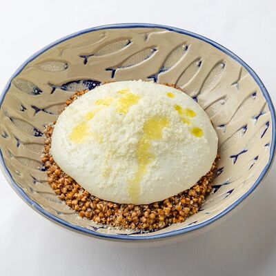 Гречневая каша с пармезаном и яйцом пашот в АFINA по цене 490 ₽