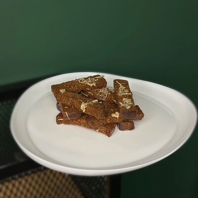 Гренки чесночные в Охота мясо по цене 210 ₽