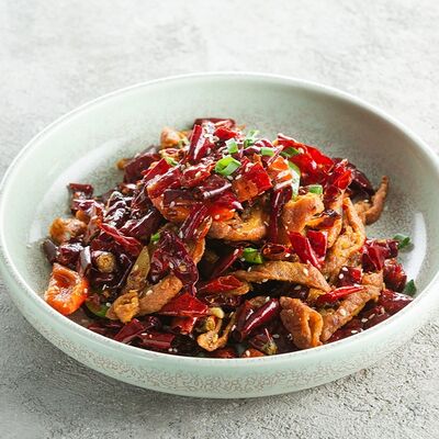 Жареная свиная гузенка с острым перцем в See China по цене 490 ₽