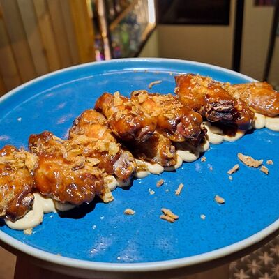 Куриные крылья Чикен вингс в Houston bar по цене 590 ₽