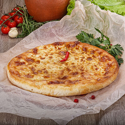 Осетинский Пирог Сыр-картошка в Грузинский дворик по цене 720 ₽