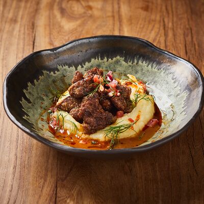 Жареная куриная печень с пюре в Dacha по цене 900 ₽