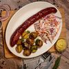 Колбаска баварская с картофелем мини и салатом коул слоу в МЯСО-ШМЯСО по цене 1000