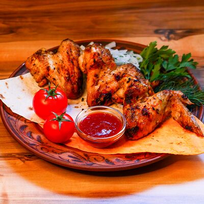 Крылья куриные на мангале в Избушка по цене 1900 ₽