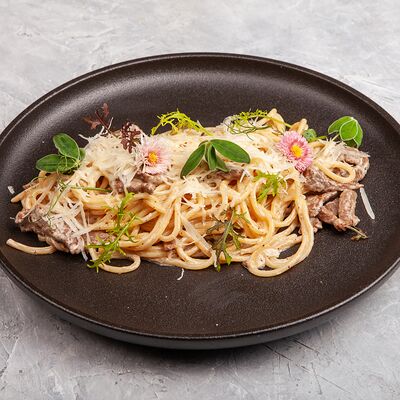 Паста с нежной сливочной телятиной в Смольный по цене 890 ₽